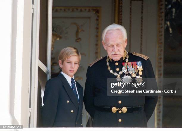 Andrea Casiraghi and Prince Rainier III of Monaco pose at the Palace balcony during the Monaco National Day Celebrations on November 19, 1995 in...