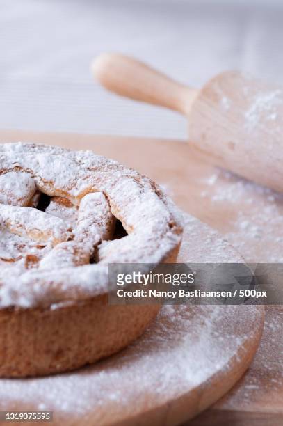 close-up of pie on table - appeltaart stock-fotos und bilder
