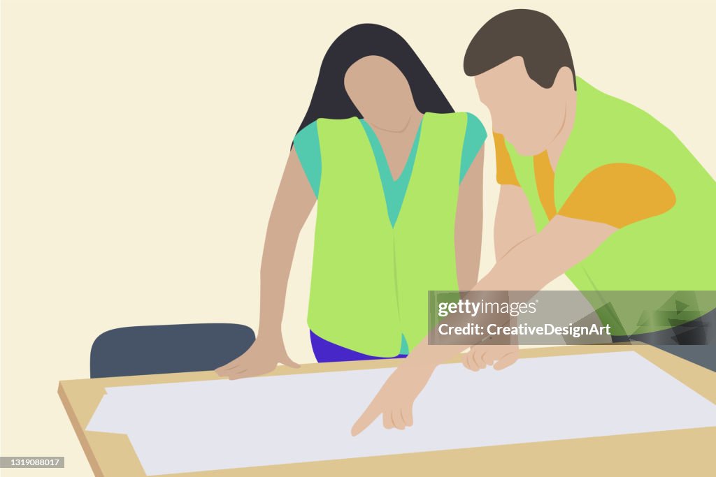 Engineer And Architect Examining The Project Of The New Building