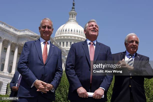 Rep. Mario Diaz-Balart , House Minority Leader Rep. Kevin McCarthy , and Rep. Carlos Gimenez listen during McCarthy’s weekly news conference outside...