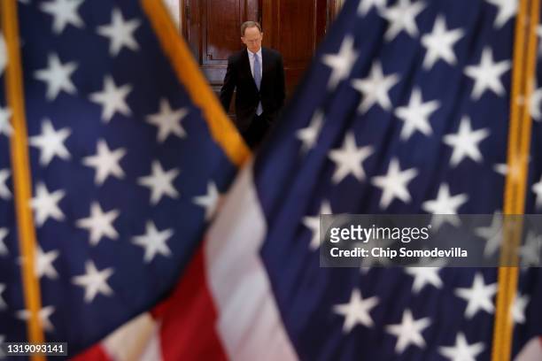 Sen. Pat Toomey leaves a Senate Republican caucus luncheon meeting in the Russell Senate Office Building on Capitol Hill on May 20, 2021 in...