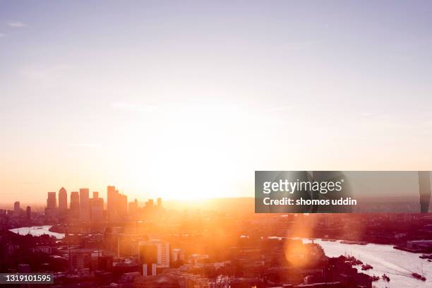 aerial cityscape over london city at sunrise - london sun stock pictures, royalty-free photos & images