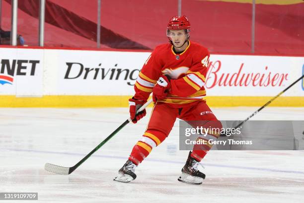 Matthew Phillips of the Calgary Flames skates in his NHL debut against the Vancouver Canucks at Scotiabank Saddledome on May 19, 2021 in Calgary,...