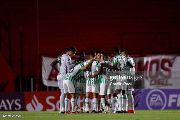 Players of Altetico Nacional huddle prior to a match between Argentinos Juniors and Atletico Nacional as part of Group F of Copa CONMEBOL...
