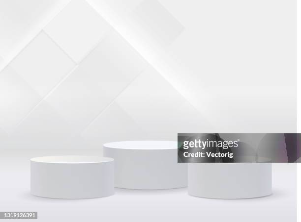studio background with realistic podium spotlight - winners podium stock illustrations