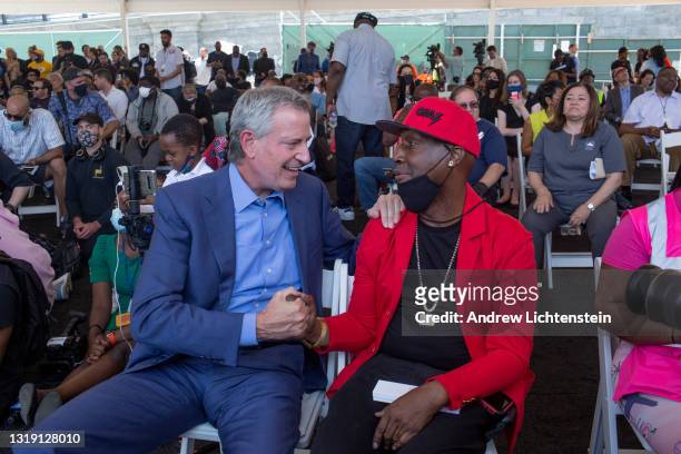 Hip Hop artist Grand Master Flash greets New York City Mayor Bill De Blasio as they both attend the ground breaking ceremony for the future Universal...