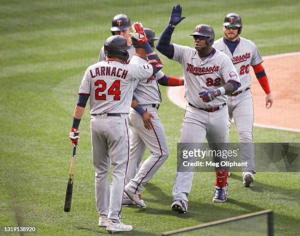Miguel Sano of the Minnesota Twins celebrates his grand slam home run in the first inning during game two of a doubleheader against the Los Angeles...