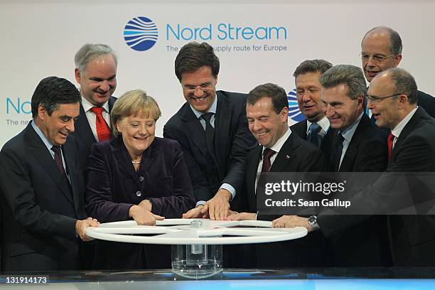 French Prime Minister Francois Fillon, German Chancellor Angela Merkel, Dutch Prime Minister Mark Rutte, Russian President Dmitry Medvedev and...