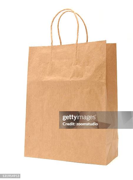 recycled paper shopping bag - brown paper shopping bag stock pictures, royalty-free photos & images