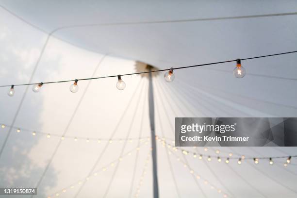 top of large event tent - circus lights stock pictures, royalty-free photos & images