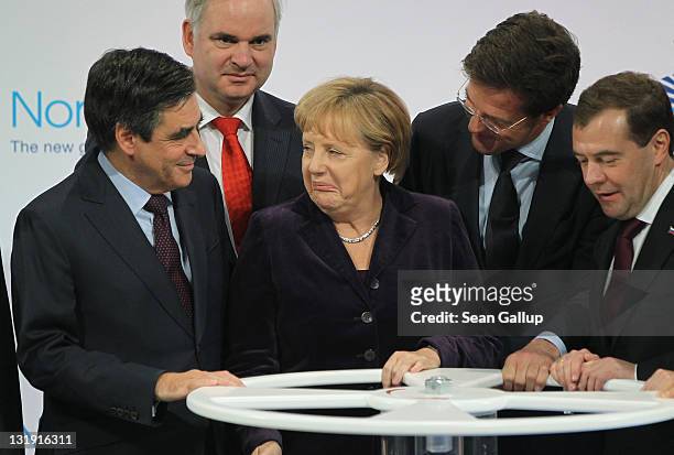 French Prime Minister Francois Fillon, Nord Stream Managing Director Matthias Warnig, German Chancellor Angela Merkel, Dutch Prime Minister Mark...