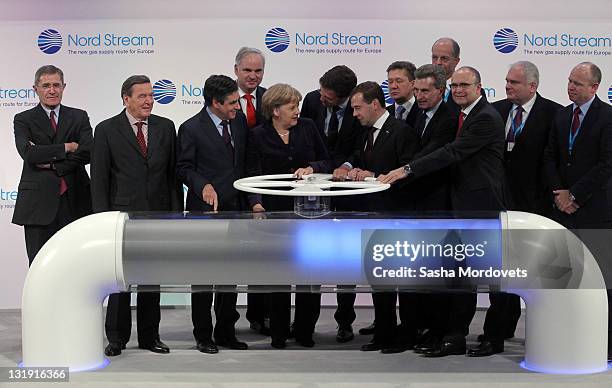 French Prime Minister Francois Fillon, German Chancellor Angela Merkel, Dutch Prime Minister Mark Rutte, Russian President Dmitry Medvedev and...