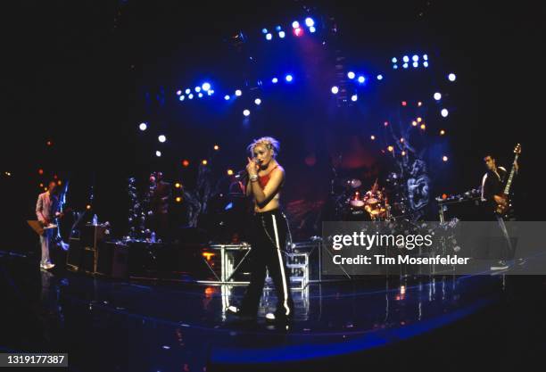 Tom Dumont, Gwen Stefani, Adrian Young, and Tony Kanal of No Doubt perform at Shoreline Amphitheatre on May 30, 1997 in Mountain View, California.