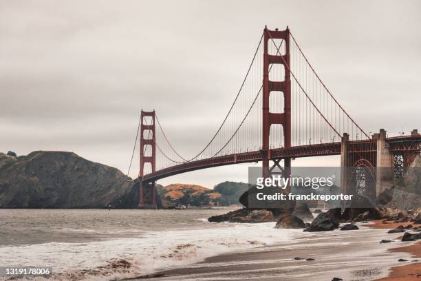 golden gate bridge in san francisco - baker beach stock pictures, royalty-free photos & images