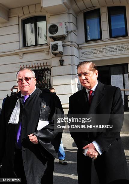 Paul Philippe de Hohenzollern and his lawyer Veronel Radulescu leave Romania's supreme court in Bucharest,on November 8, 2011. Romania's supreme...