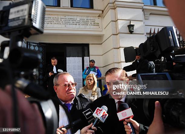 Paul Philippe de Hohenzollern and his lawyer Veronel Radulescu address media after they leave Romania's supreme court in Bucharest, on November 8,...