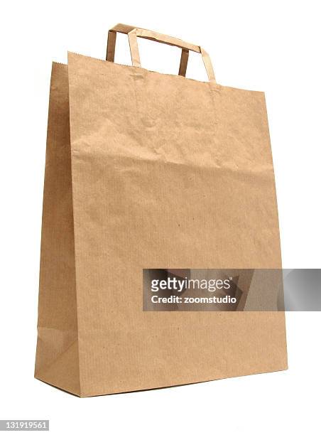 recycled paper shopping bag - brown paper isolated stock pictures, royalty-free photos & images