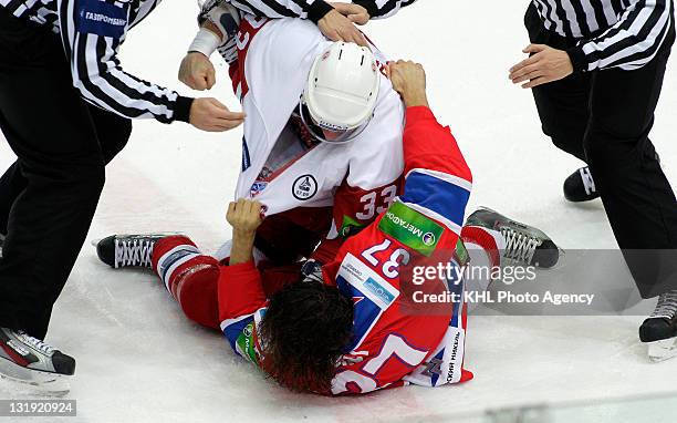 Darsy Verot of the CSKA and Jeremy Yablonski of the Vityaz fight during the game between Vityaz Chekhov and CSKA Moscow during the KHL Championship...