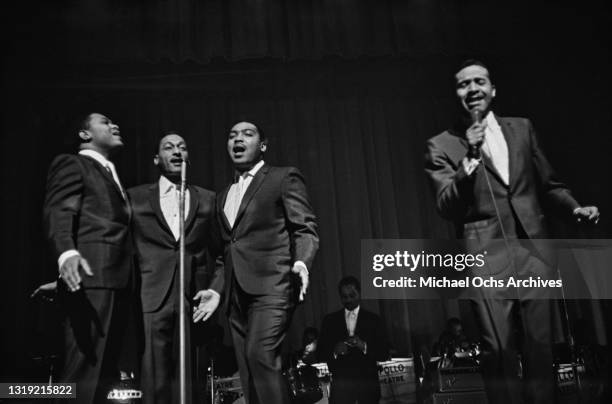 American soul singers The Four Tops perform live at the Apollo Theater in the Harlem neighbourhood of Manhattan, New York City, New York, circa 1965.