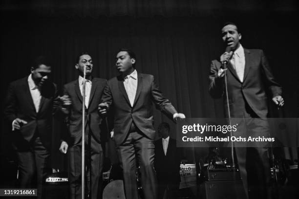 American soul singers The Four Tops perform live at the Apollo Theater in the Harlem neighbourhood of Manhattan, New York City, New York, circa 1965.