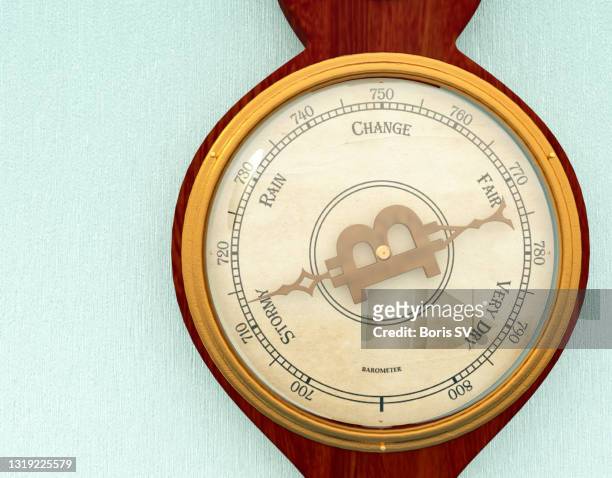 barometer with bitcoin as a finger - a picture of a barometer stock pictures, royalty-free photos & images