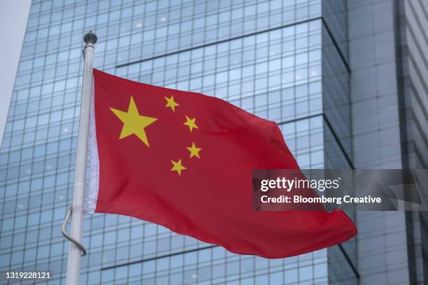 chinese national flag - flagpole sitting stockfoto's en -beelden