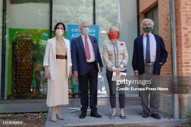 The acting president of the Community of Madrid, Isabel Diaz Ayuso and the writer Mario Vargas Llosa , attend the presentation of the new book by...