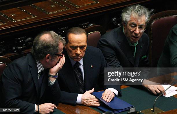Interior Minister Roberto Maroni, Italian Prime Minister Silvio Berlusconi and Reform Minister Umberto Bossi attend a vote at the Chamber of Deputies...
