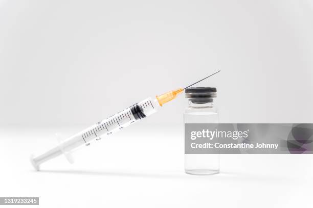 syringe and vial on white background - antibiotic injection stock pictures, royalty-free photos & images