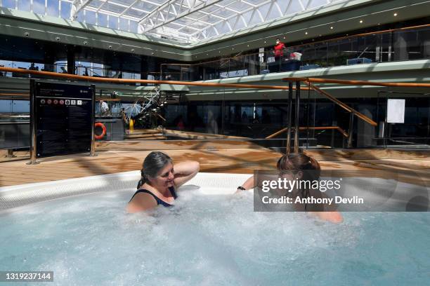 Guests enjoy the Tropical Pool during the first sailing of brand new ship MSC Virtuosa, the first cruise to depart the UK since lockdown on May 20,...