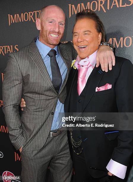 Rugby player Gareth Thomas and actor Mickey Rourke arrive at Relativity Media's "Immortals" premiere presented in RealD 3 at Nokia Theatre L.A. Live...
