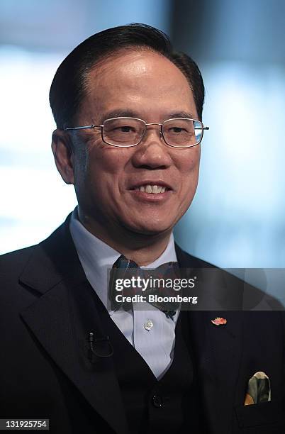 Donald Tsang, Hong Kong's chief executive, smiles during an interview in New York, U.S., on Tuesday, Nov. 8, 2011. Tsang said it’s “possible” that...