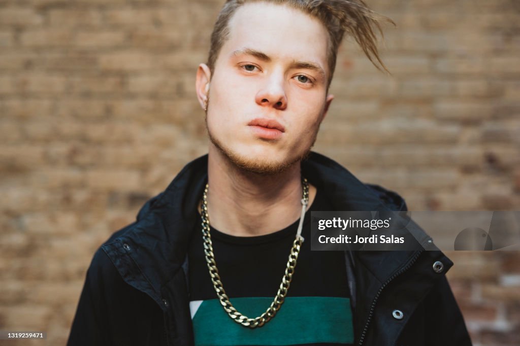 Portrait of young man on the street