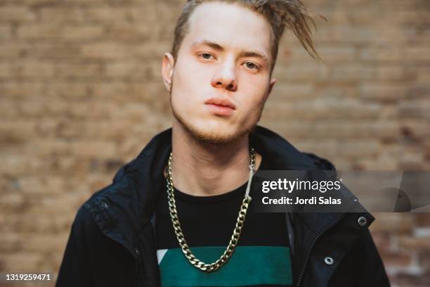 portrait of young man on the street - spain teen face imagens e fotografias de stock