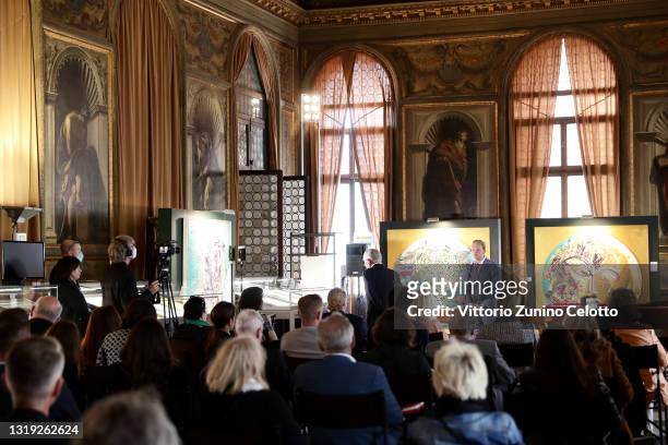 Leon Löwentraut attends the exhibition opening "Leonismo" by artist Leon Loewentraut on May 21, 2021 in Venice, Italy. In the library, directly on...