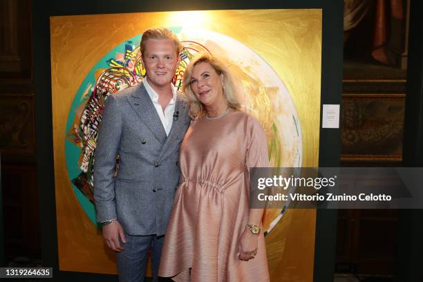 Leon Löwentraut and Heike Löwentraut attend the exhibition opening "Leonismo" by artist Leon Loewentraut on May 21, 2021 in Venice, Italy. In the...