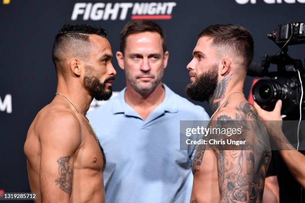 Rob Font and Cody Garbrandt face off during the UFC Fight Night weigh-in at UFC APEX on May 21, 2021 in Las Vegas, Nevada.