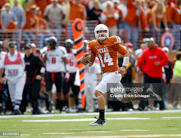 Quarterback David Ash of the Texas Longhorns breaks away for a long second quarter rush against the Texas Tech Red Raiders on November 5, 2011 at...