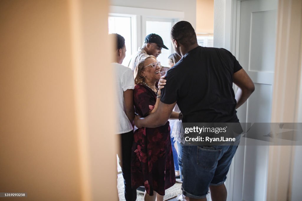 Extended Family Reuniting Together For Gathering