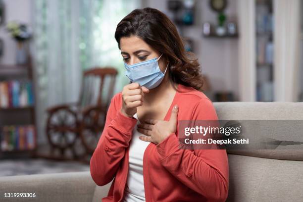 woman at home - stock photo - covid 19 india stock pictures, royalty-free photos & images