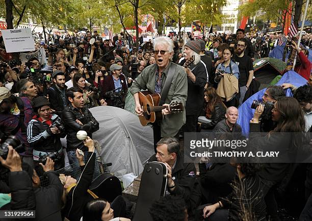 Musicians Graham Nash and David Crosby perform for Demonstrators with 'Occupy Wall Street' as they continue their protest at Zuccotti Park in New...