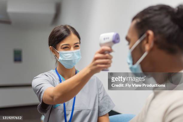 staying vigilant during the covid-19 pandemic - infectious disease control stock pictures, royalty-free photos & images