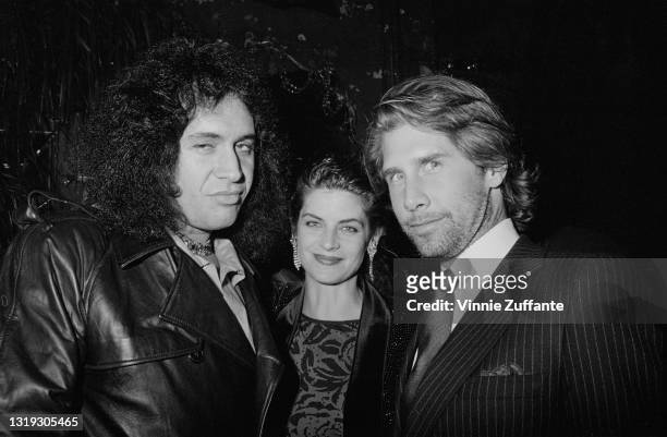 Israeli-American singer-songwriter and musician Gene Simmons with American actress Kirstie Alley and her husband, American actor Parker Stevenson...