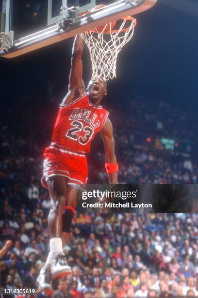 Michael Jordan of the Chicago Bulls takes a jump shot during a NBA basketball game against the Washington Bullets at the Capital Centre on December...