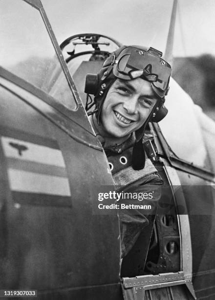 Captain Frank A. Hill of Hillsdale N.J. In the cockpit of his fighter plane from which he shot down a Focke Wulf 190 during the Dieppe Raid of August...