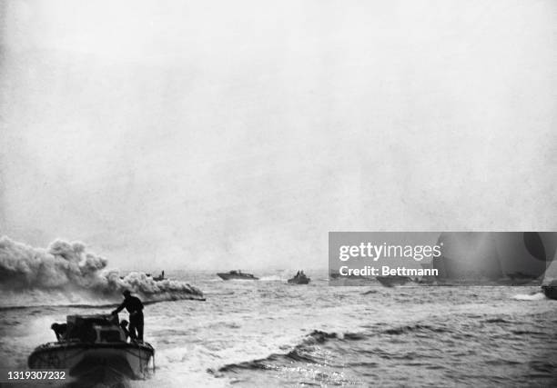 British Naval boats laying down a smoke screen to cover commandos landing in the the Dieppe Raid of August 19, 1942.