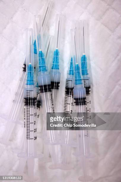 Syringes loaded with doses of the Moderna coronavirus vaccine are ready to be used during a clinic at CASA de Maryland's Wheaton Welcome Center on...