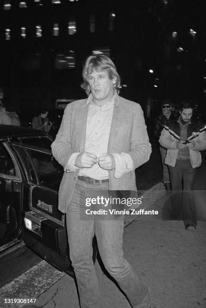 American actor Nick Nolte, wearing a blazer, white shirt and jeans, outside Sardi's, a restaurant in Manhattan's Theater District in New York City,...