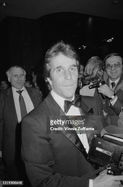 American actor Henry Winkler, wearing a tuxedo and bow tie, attends the Night of 100 Stars Benefit Gala, held at the New York Hilton Hotel in New...