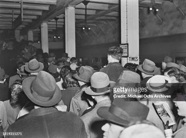 Crowds attempt to leave a platform at Times Square New York City Subway Station, Times Square in the Manhattan borough of New York City, New York,...